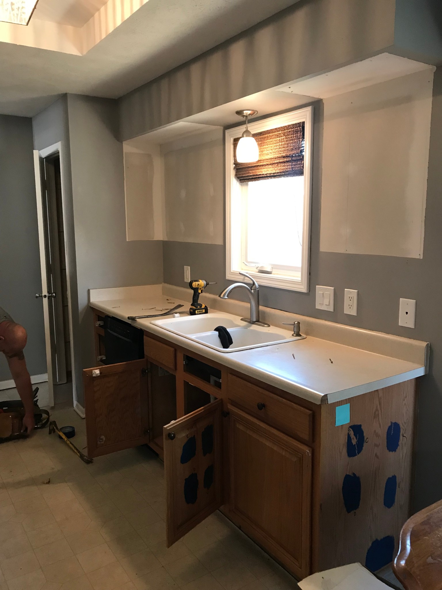 Dark Blue Lower Cabinets With White Upper Cabinets Kitchen Remodel by BAJCO Construction project photo 4